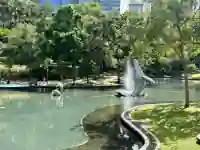 Grünanlage des KLCC Parks mit Blick auf die Skyline von Kuala Lumpur